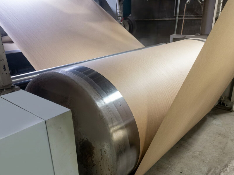 Paper wrapped around a preheating cylinder