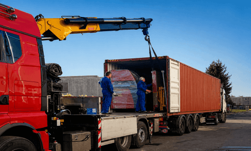 Equipment loading by truck crane