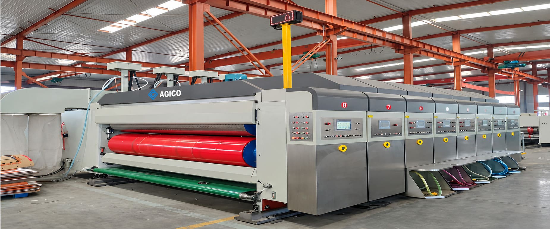the flexo printer slotter die cutter in a factory.